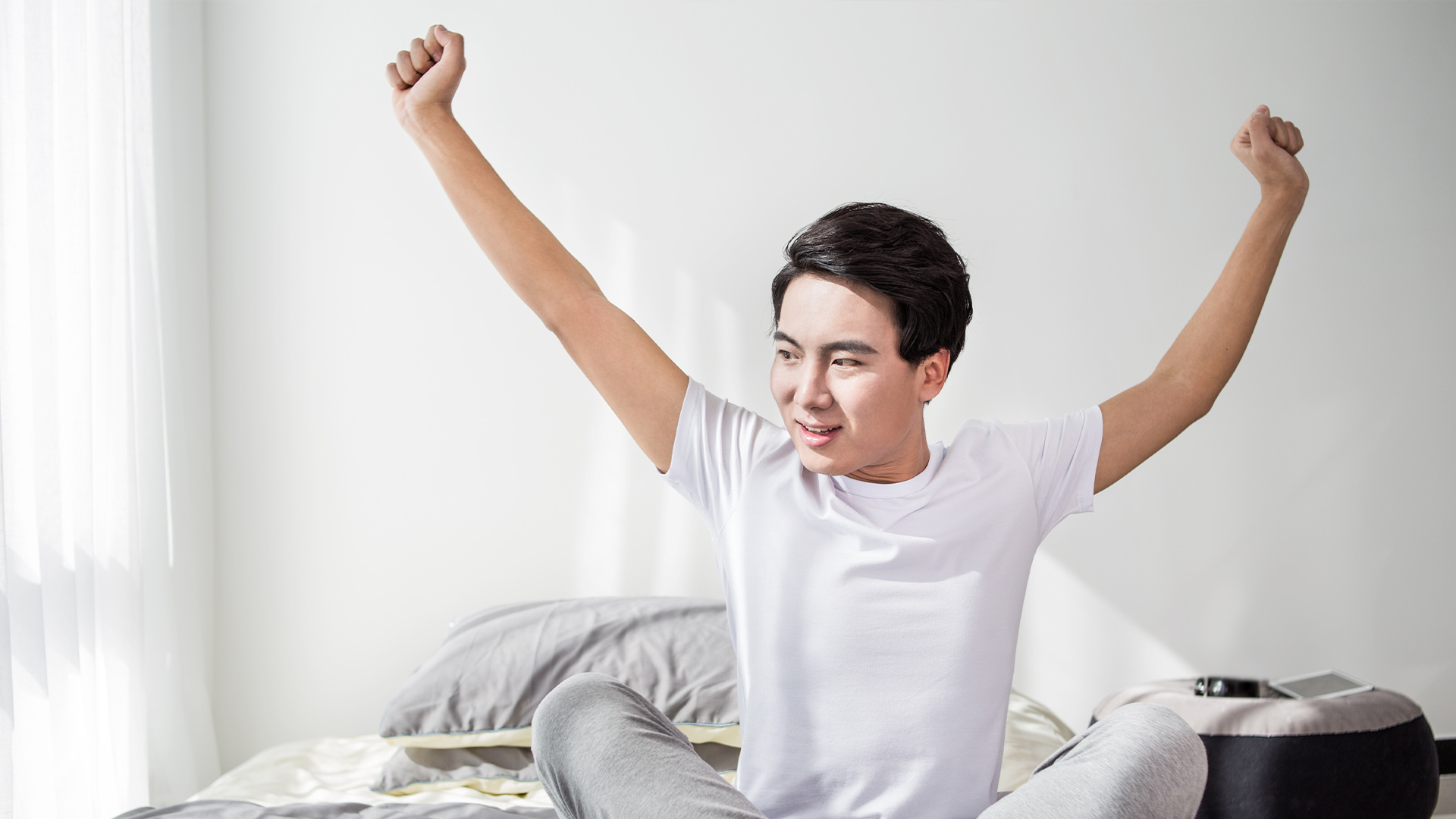 Young man stretching